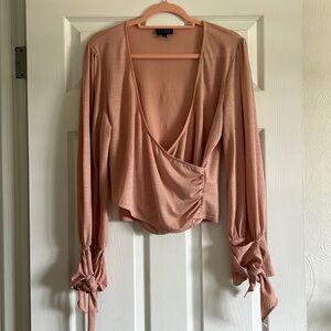 Topshop- Rose blouse with deep V opening, sleeves w/ties at wrists, gently used